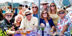 Men and women enjoying beer at the Ojai Wine Festival